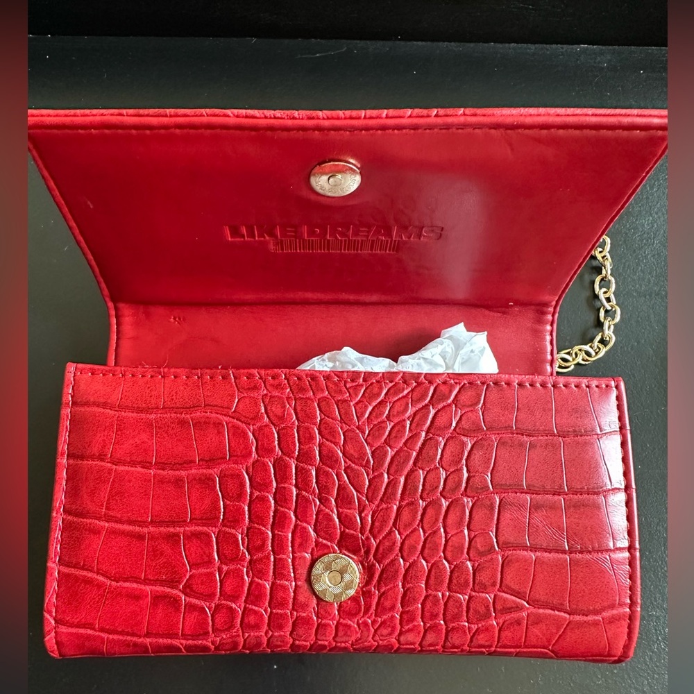 Red alligator leather small clutch with gold Crossbody chain.